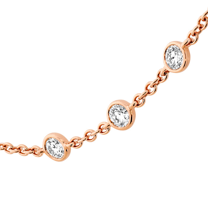 Bezel set diamond necklace in rose gold