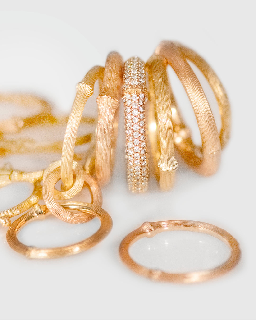 stack of yellow gold ole lynggaard nature rings