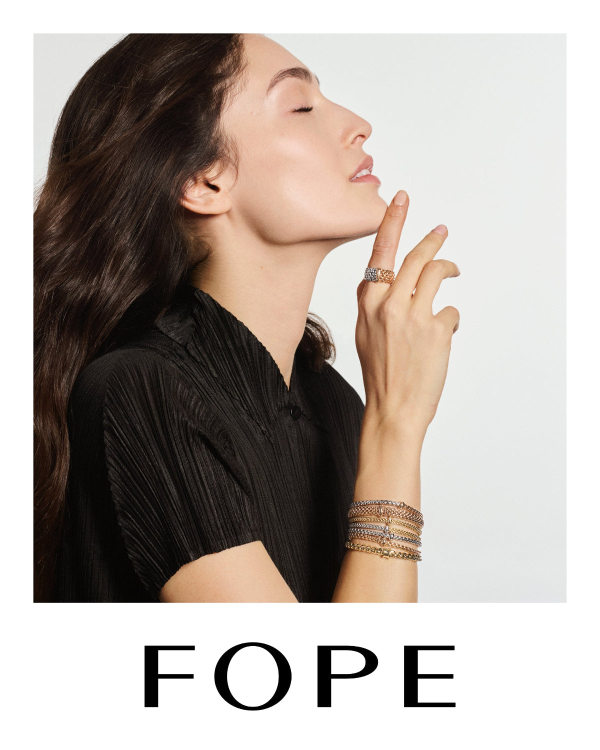 multiple Fope bracelets stacked