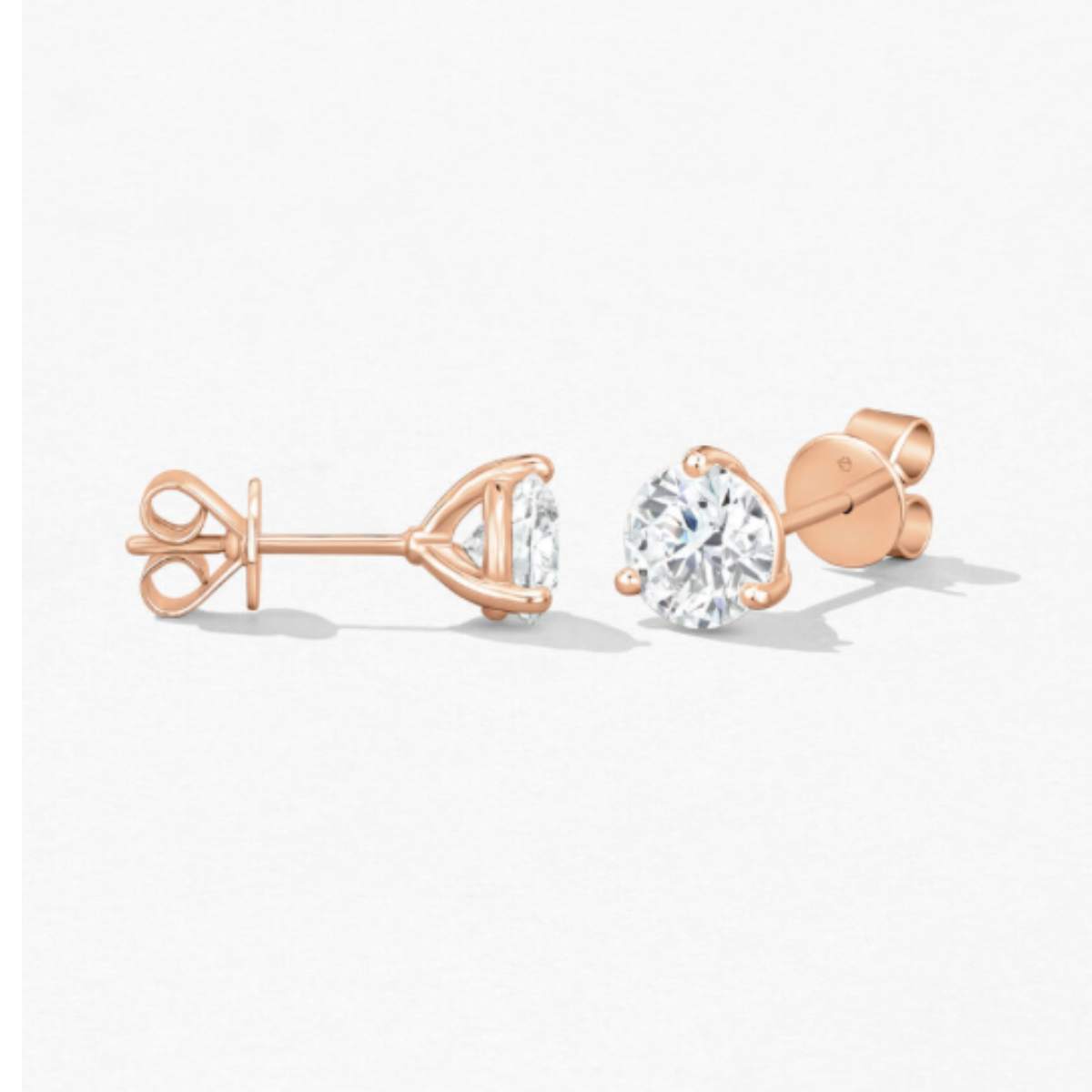 Hearts on Fire rose gold diamond studs. Trewarne Fine jewellery, Melbourne