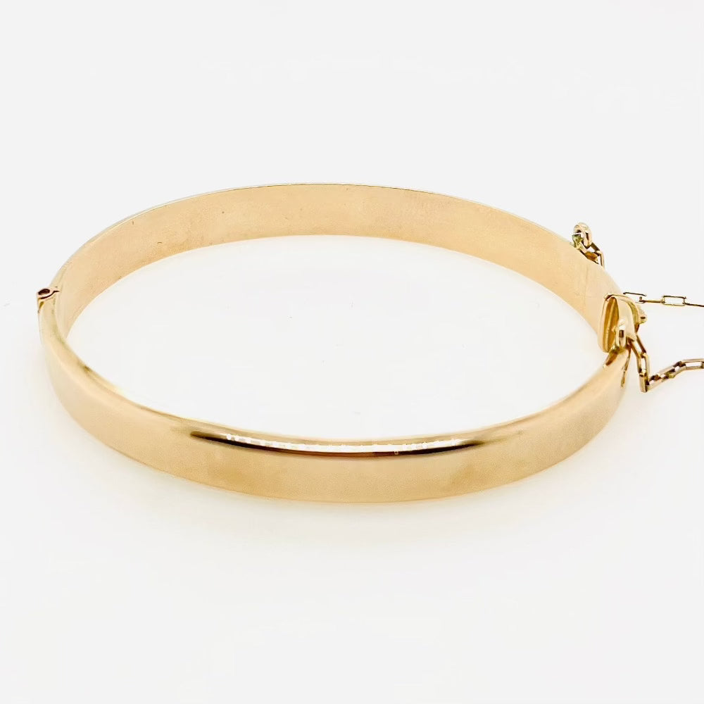 9ct yellow gold hinged oval bangle