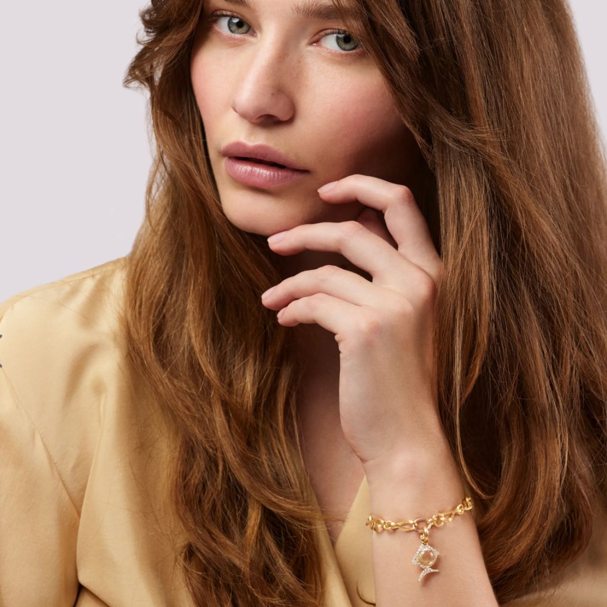 Young fish rutile pave charm on love bracelet 