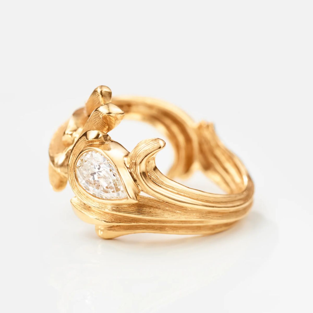 Ole Lynggaard Ocean Waves diamond ring, image on angle to see detail.
