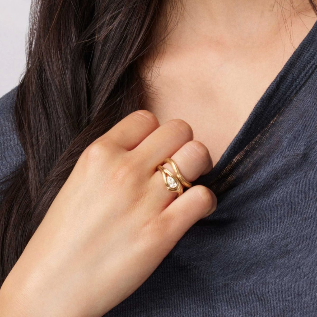 Ole Lynggaard Ocean Drop Solitaire ring worn with under the sea ring