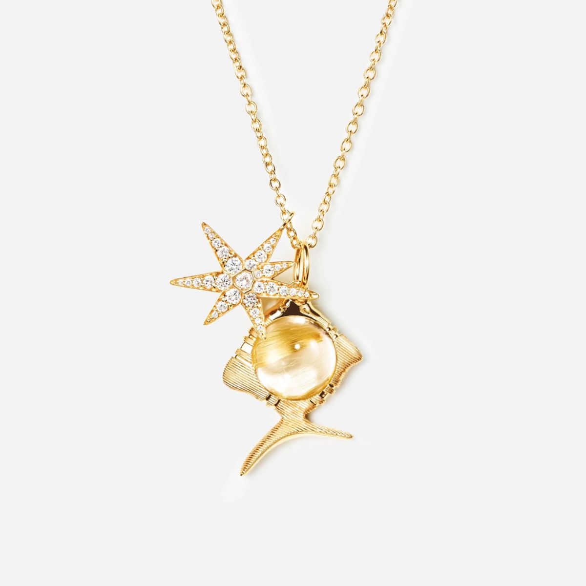 Ole Lynggaard rutile fish pendant with funky stars diamond pendant