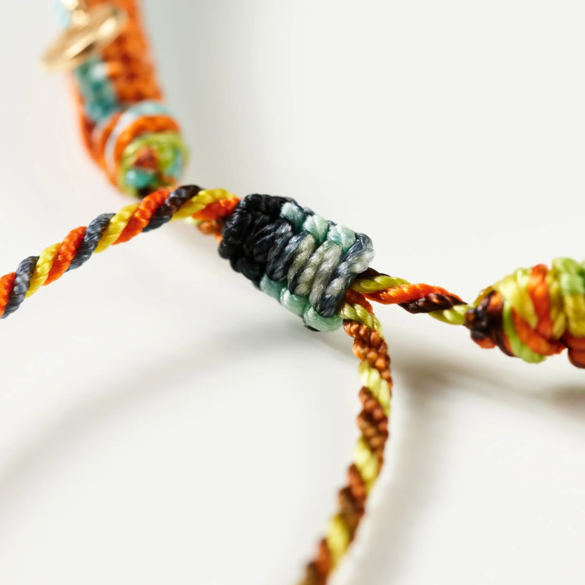 close up of Ole Lynggaard colour Seaside life bracelet drawstring clasp