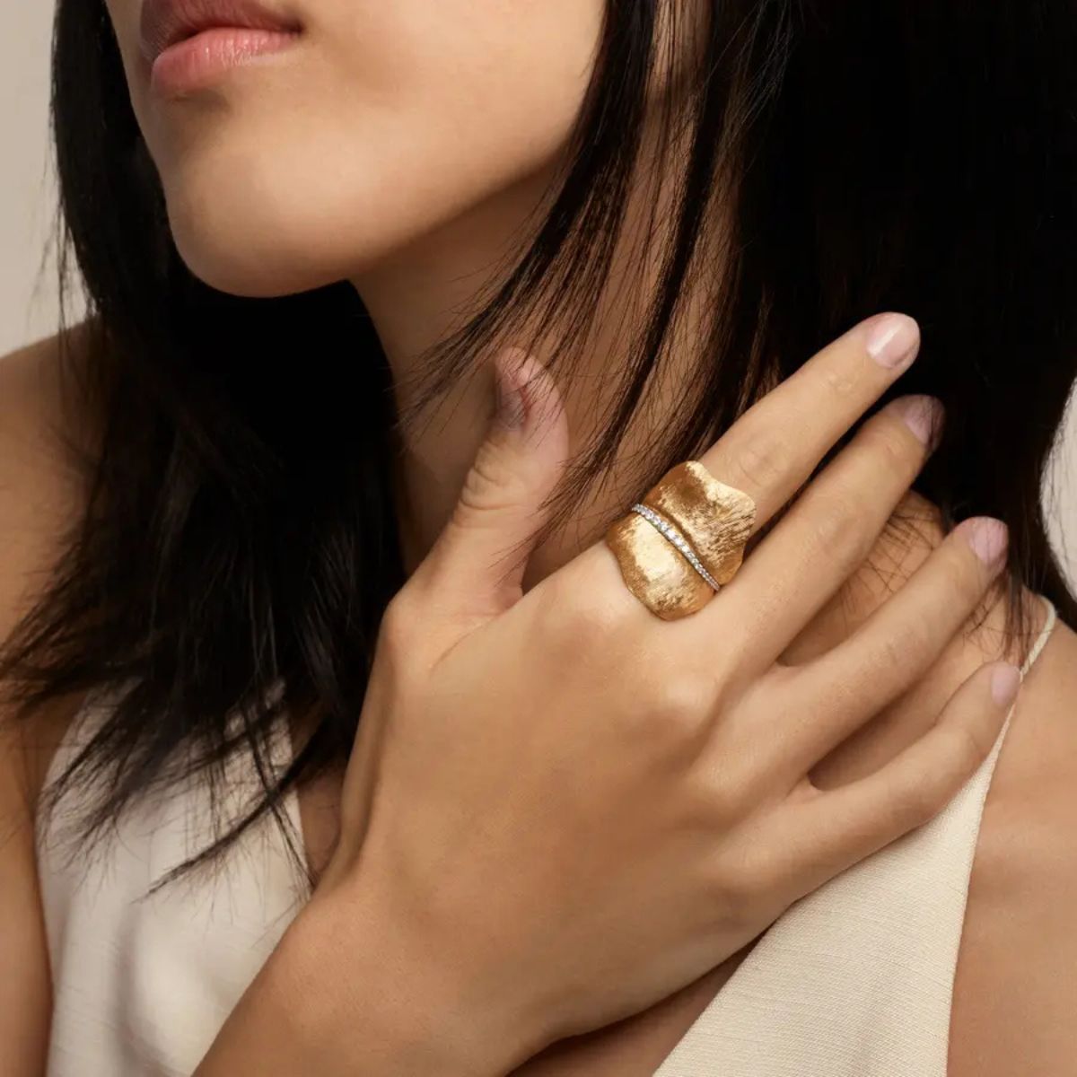 Ole Lynggaard large leaf ring with diamonds worn on model