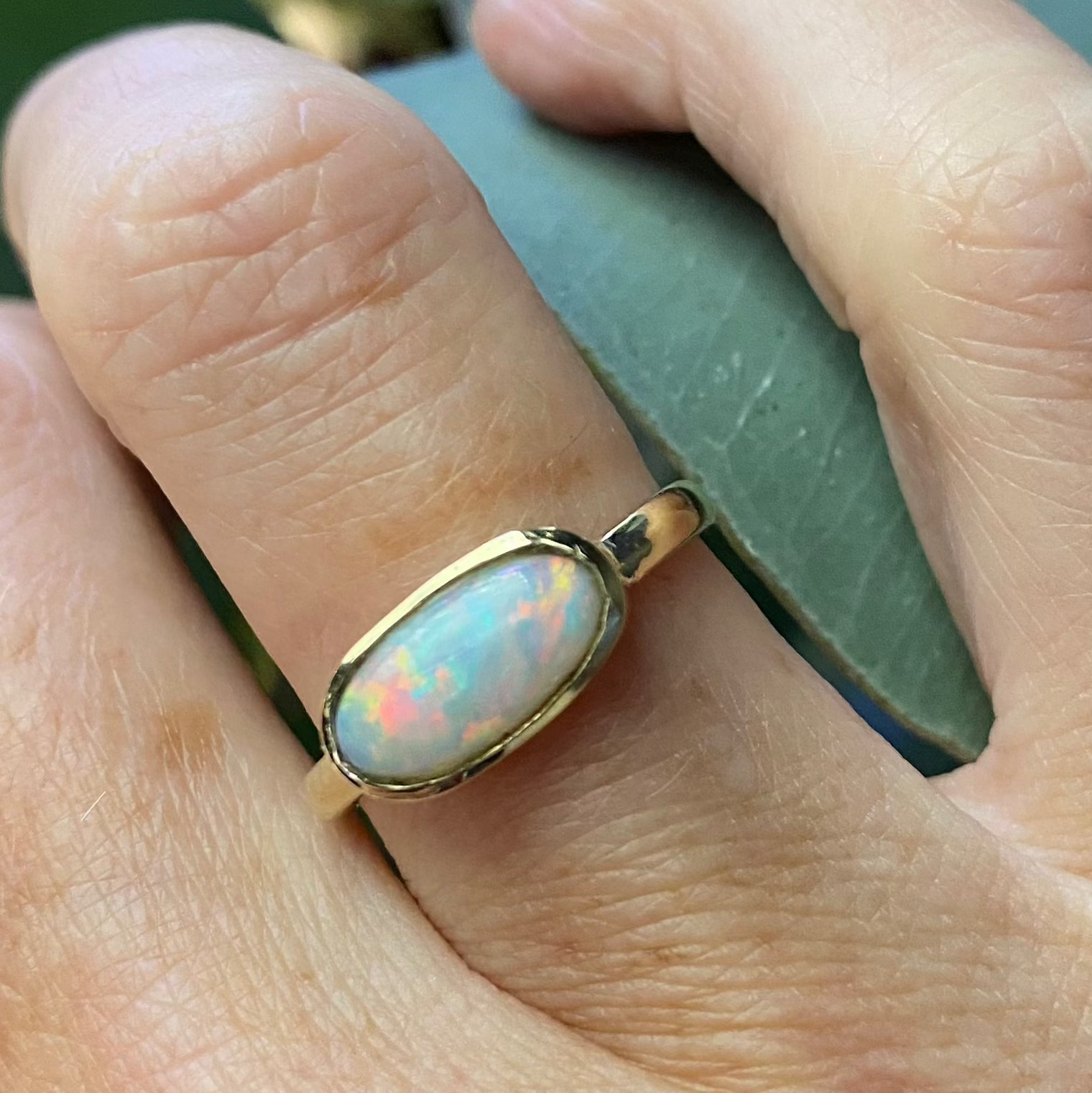 Solid white opal ring