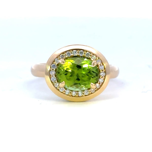18ct yellow gold halo with Peridot dress ring
