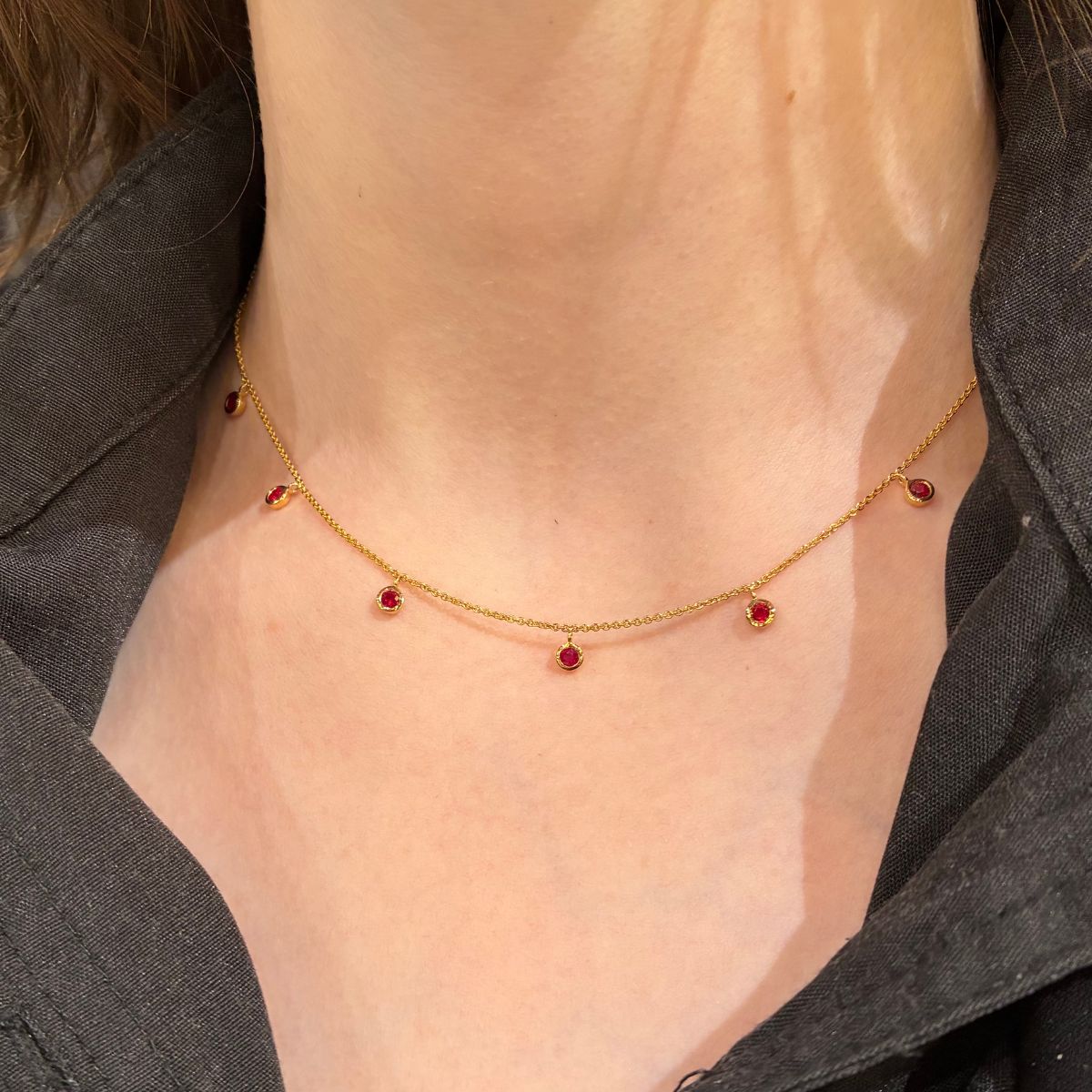 Ruby necklace worn on lady by Trewarne