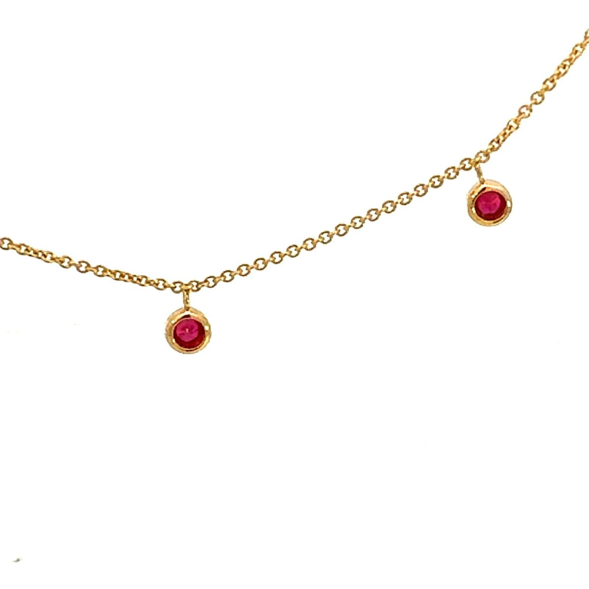 close up of Rubies set in bezel settings by Trewarne Jewellers