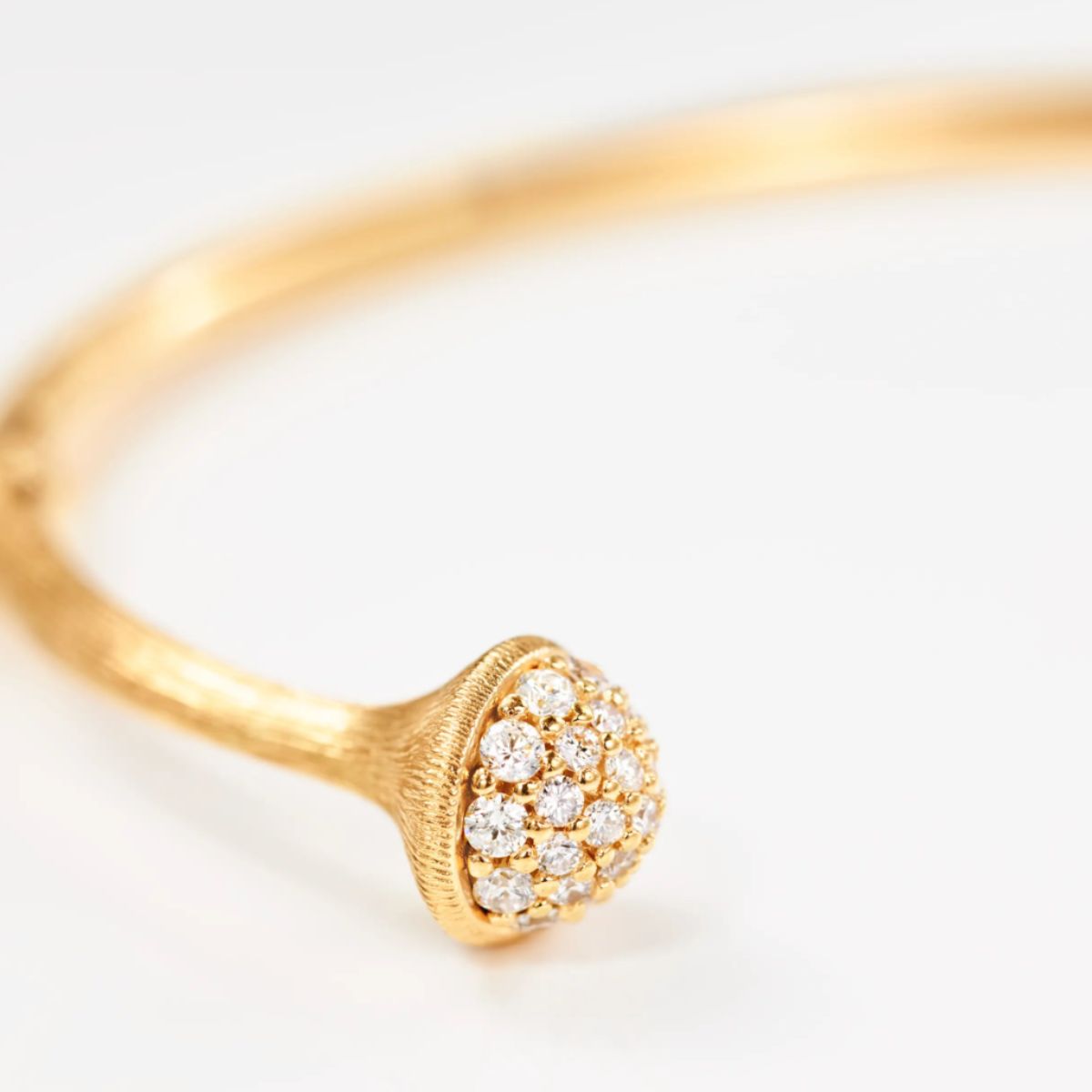 Ole Lynggaard Pave Nature bangle close up of texture and diamond setting