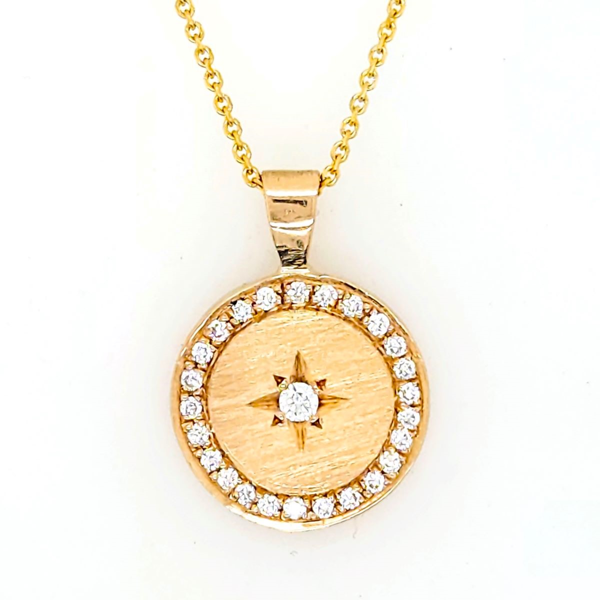 Yellow gold diamond star set medallion pendant