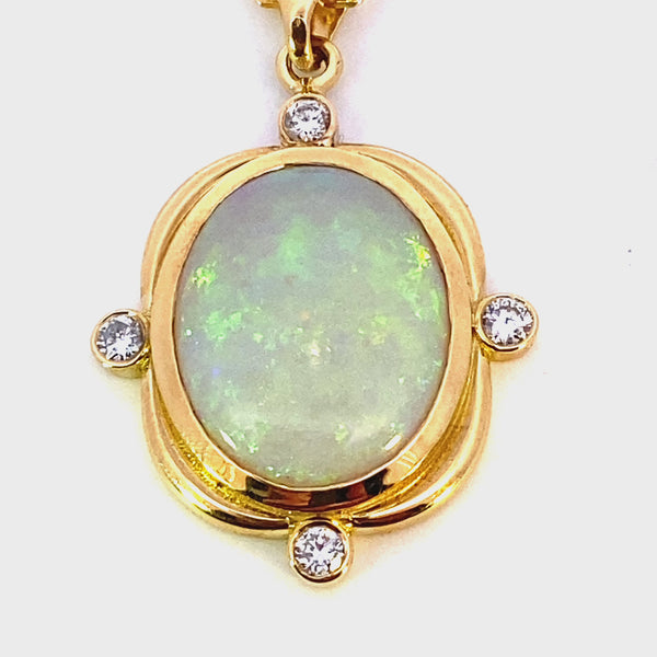 18ct yellow gold solid white opal and diamond pendant