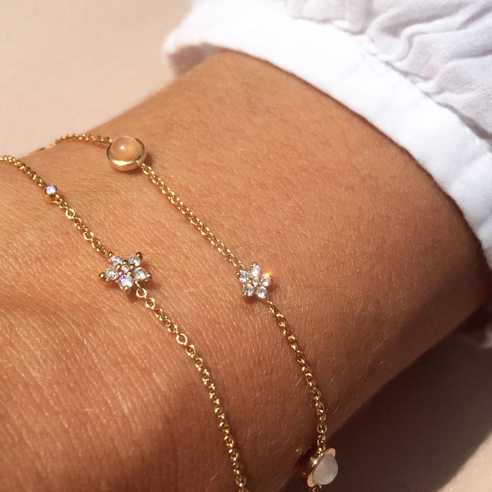 Ole Lynggaard shooting star bracelets on ladies wrist