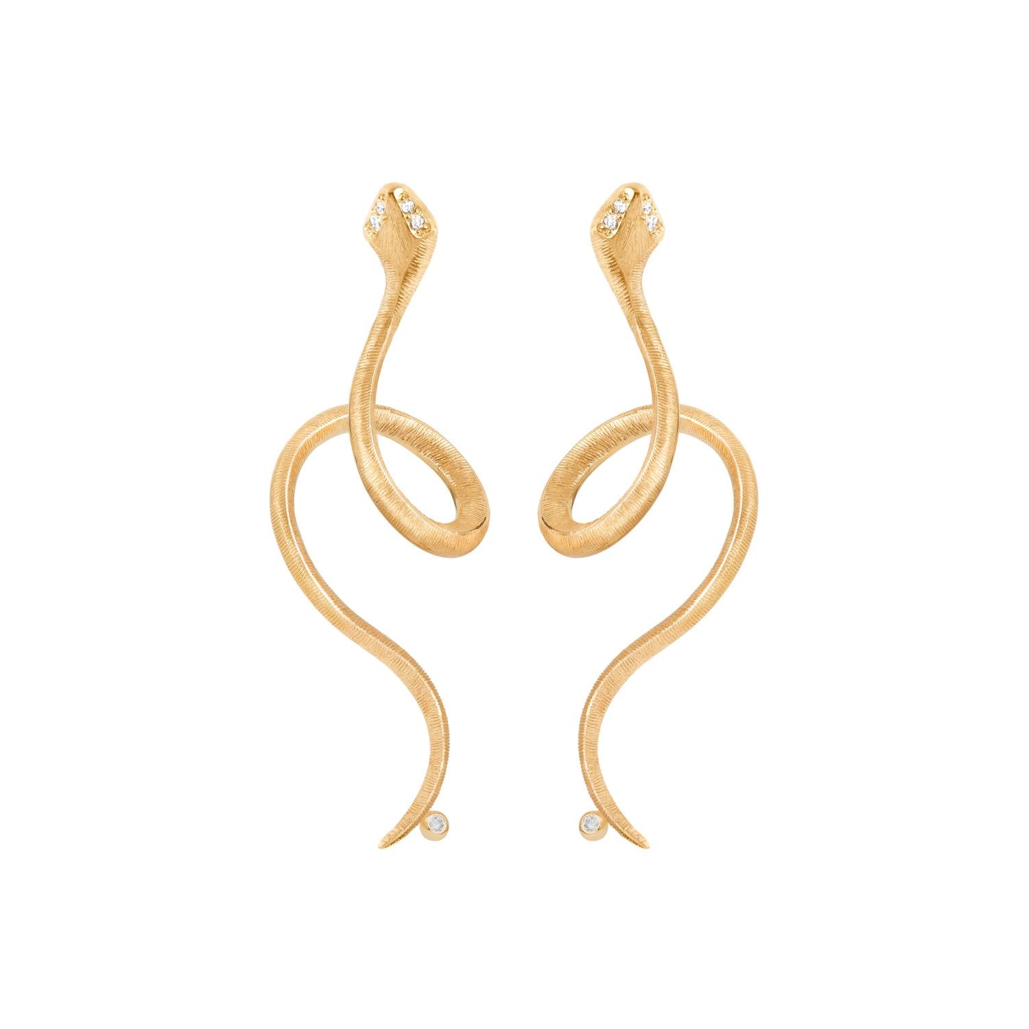 Ole Lynggaard gold snake earrings with diamond eyes