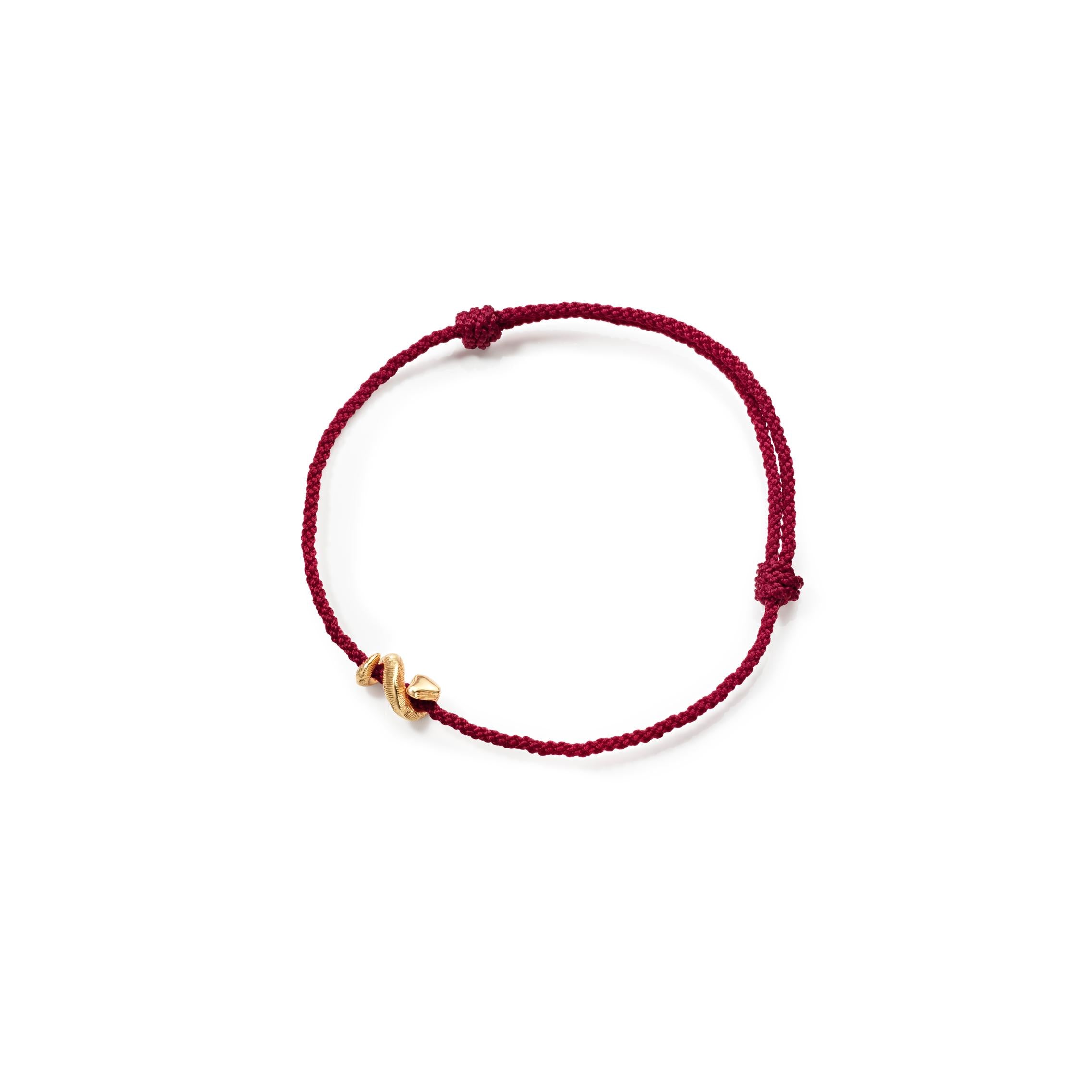 Ole Lynggaard Snake on red string