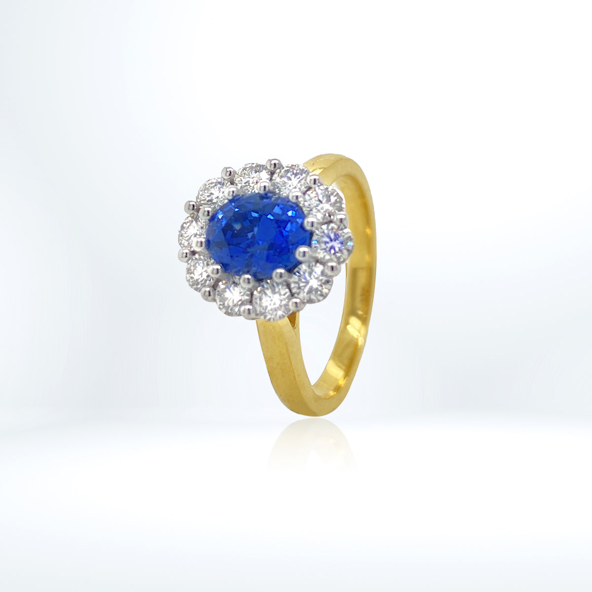 Aurora Oval Sapphire and Diamond Cluster Goddess Ring