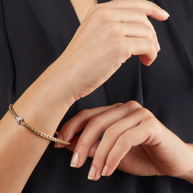 Stretchy gold and diamond bracelet